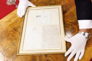Auction with letter from the Queen